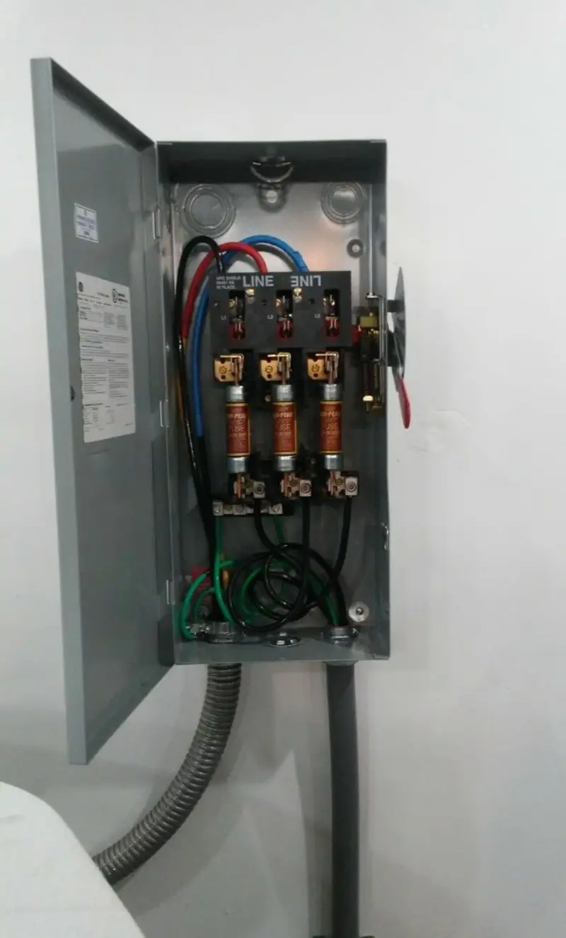 Three-phase disconnect switch installed for Smoke Detector Installation in Tropical Park